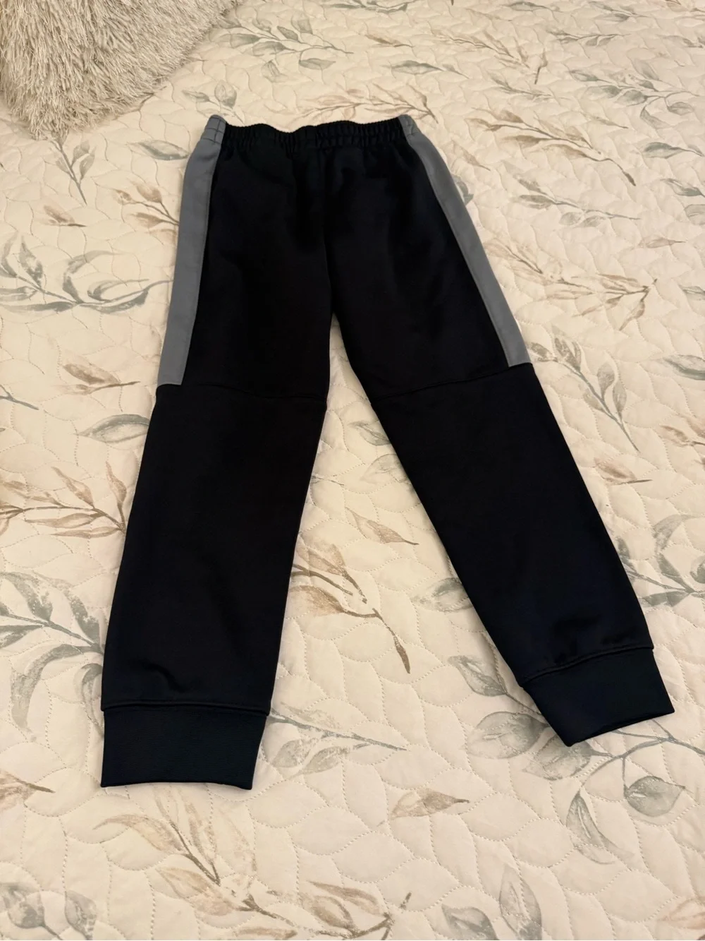 Nike Kids Black Joggers with Grey Side Panel and Neon Yellow Swoosh boy size 7 .
